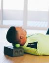 Man rolling neck out with Rad Roller Soft